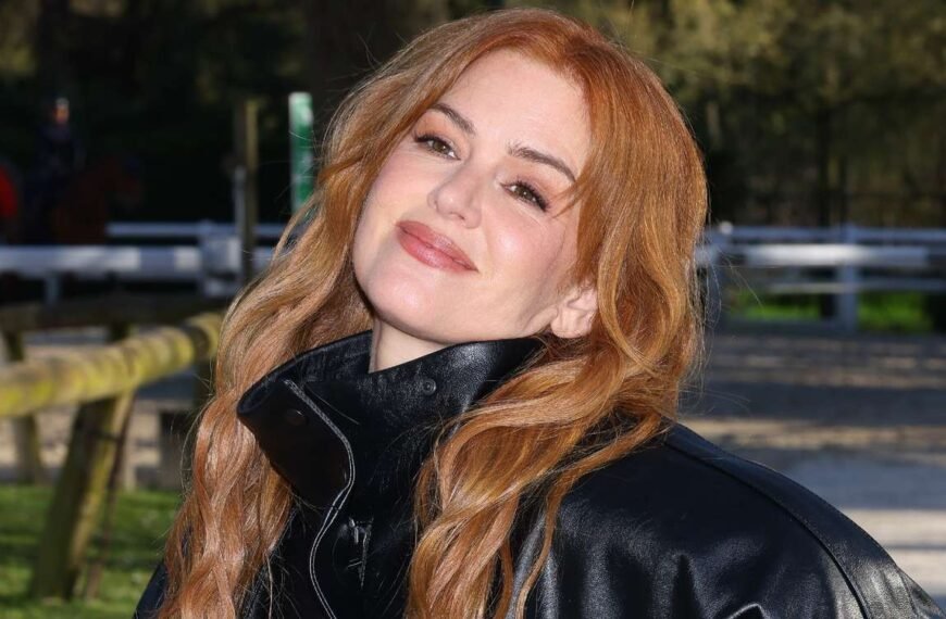 Isla Fisher Steals the Spotlight at Paris Fashion Week in a Bold Look Without Pants