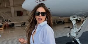 Jennifer Lopez Stuns at the Airport in a Stylish Button-Up and a Rare Birkin Bag