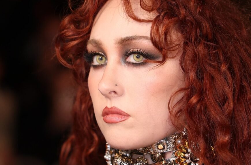 Chappell Roan Shows Off a Chic Sheer Dress and Coordinated Thong at Paris Fashion Week