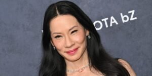 Lucy Liu Stuns in a Chic Velvet Little Black Dress Adorned with Sparkling Crystals