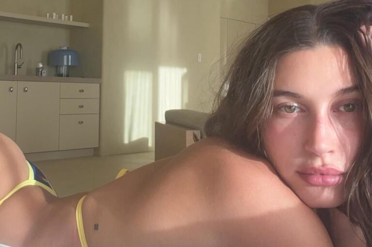 Hailey Bieber Enjoys a Relaxing Day by the Pool in Her Sunny Yellow Bikini