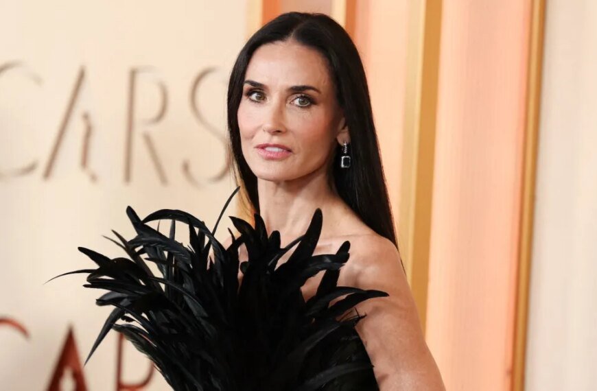 Demi Moore Wows in Stunning Feathered Dress at the 2026 Oscars Red Carpet