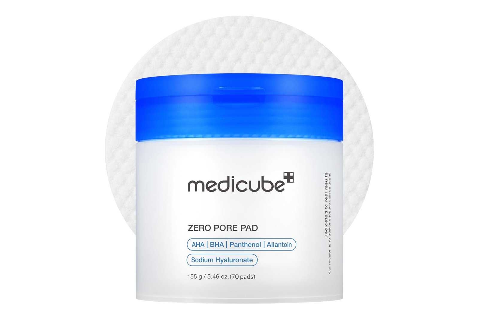 A Medicube Zero Pore Pad container with blue lid and text listing ingredients.