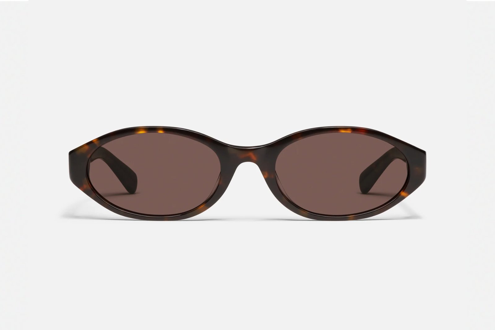 Tortoise shell sunglasses with dark brown lenses.