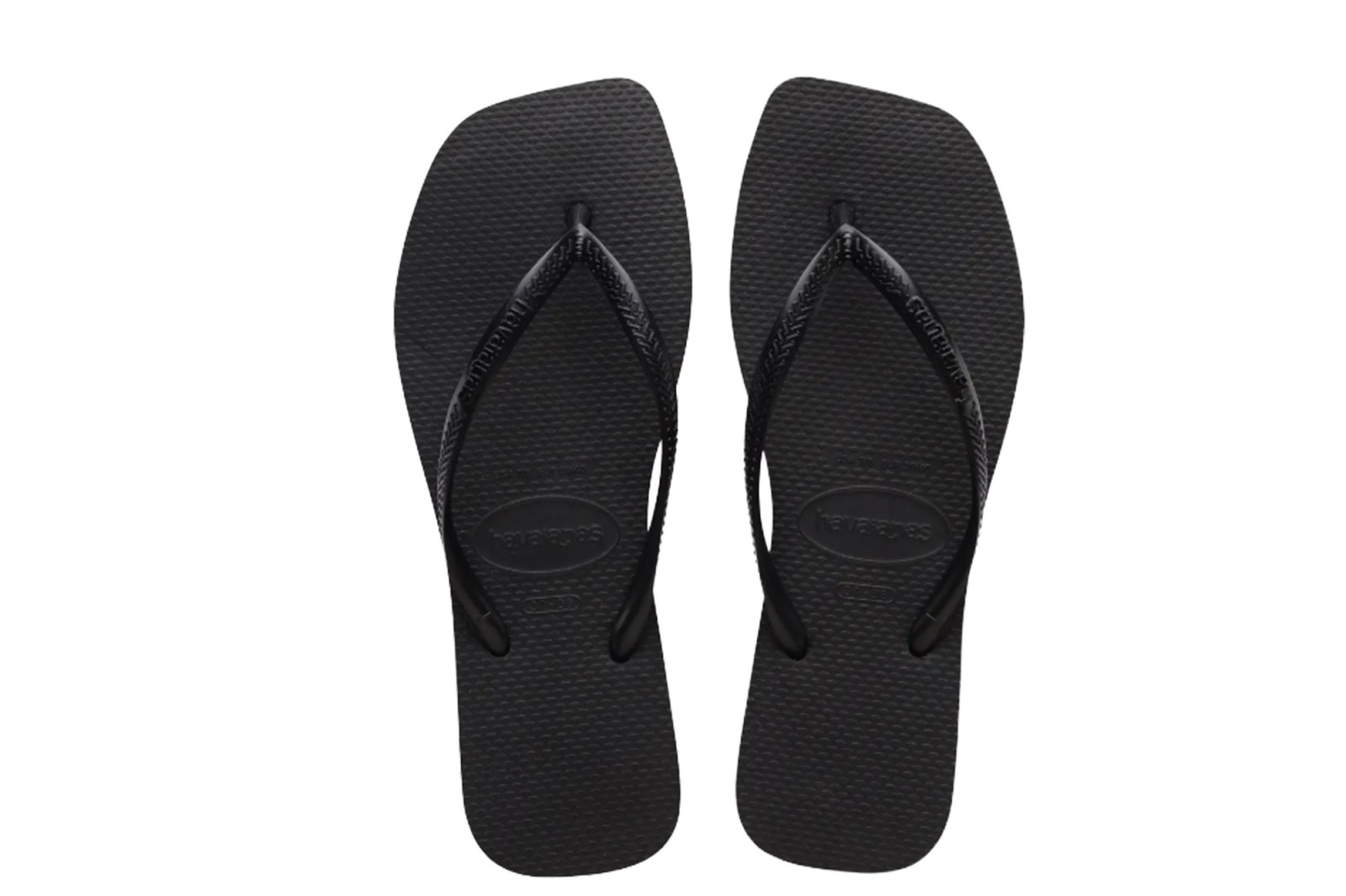 A pair of black Havaianas flip-flops.
