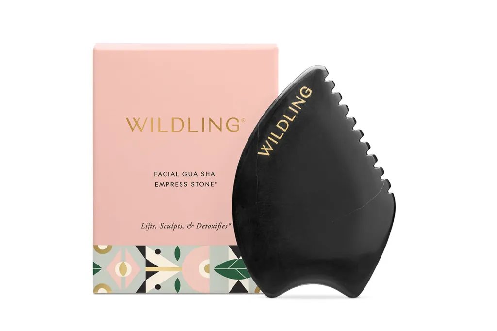 Wildling facial gua sha Empress Stone with its pink box.