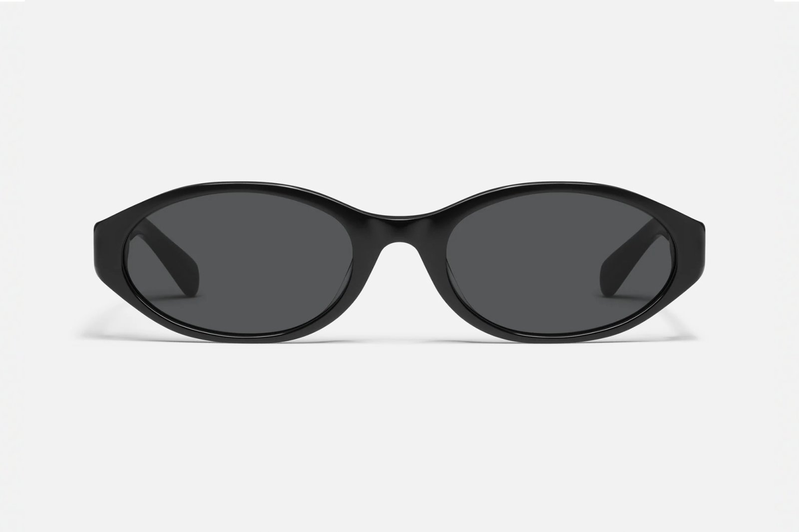 Black sunglasses with thick frames and dark lenses.