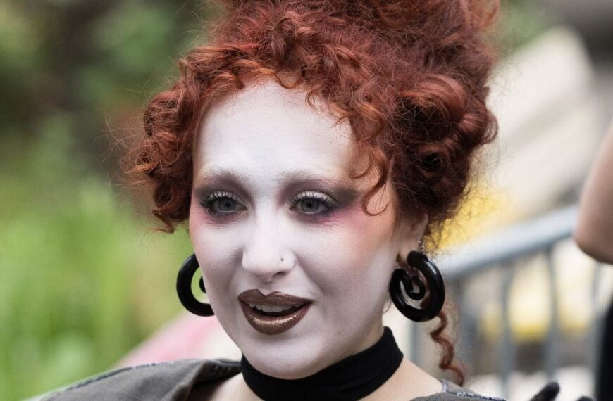 Chappell Roan Styles a Plunging Corset with a Chic Backless Skirt and Iconic Marge Simpson Hair