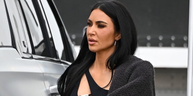 Kim Kardashian Stuns in a Sparkling Corset Bodysuit and Feathered Headdress
