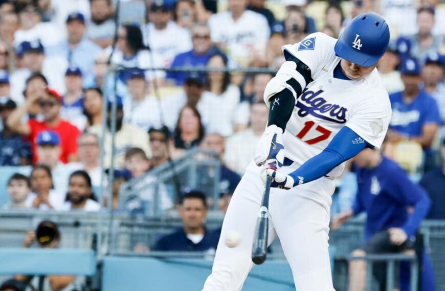 Plaschke: Dodgers Celebrate Titles on a Bright Opening Day