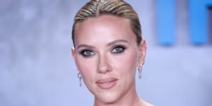 Scarlett Johansson Styles a Cute Crochet Halter Top with a Fun Sarong and Wavy Hair