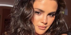 Selena Gomez Looks Radiant in a Simple Robe and Gorgeous Curls