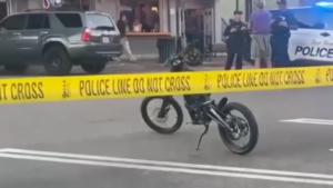 Teen on Electric Motorcycle Collides with Elderly Pedestrian, Leading to Hospitalization