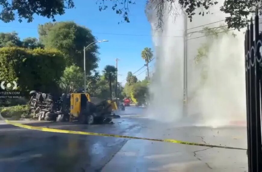 Water Spews from Broken Hydrant Following Crash in Encino