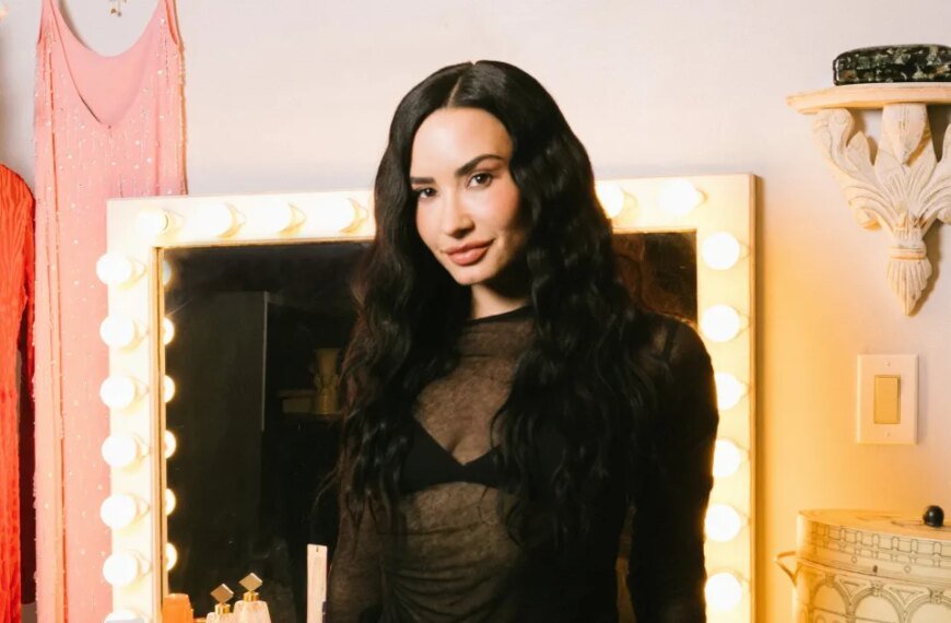 Demi Lovato Shares What's in Her Bag: Crystals, Lip Balm, and a Digital Camera