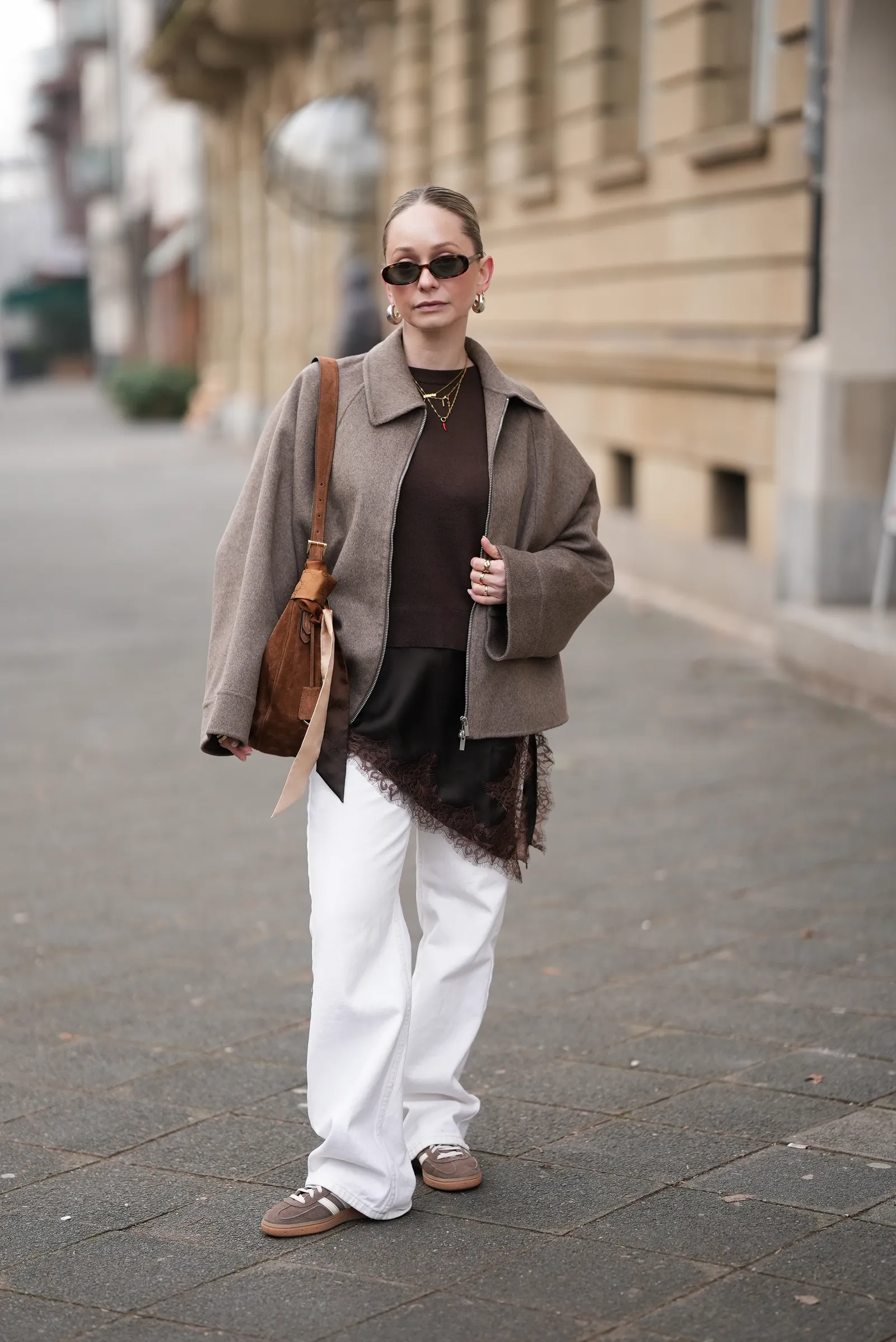 FRANKFURT AM MAIN GERMANY JANUARY 21 Sonia Sofianidou is seen wearing a brown wool jacket with a clean structured shape...