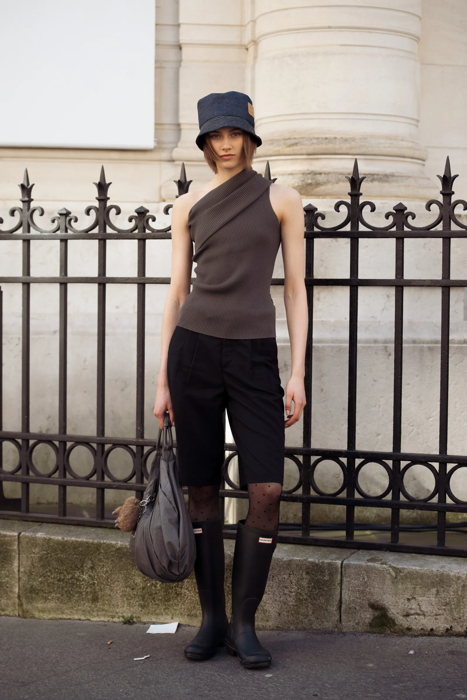 Image may contain Lorena Rae Clothing Shorts Pants Sleeve Adult Person Accessories Bag and Handbag