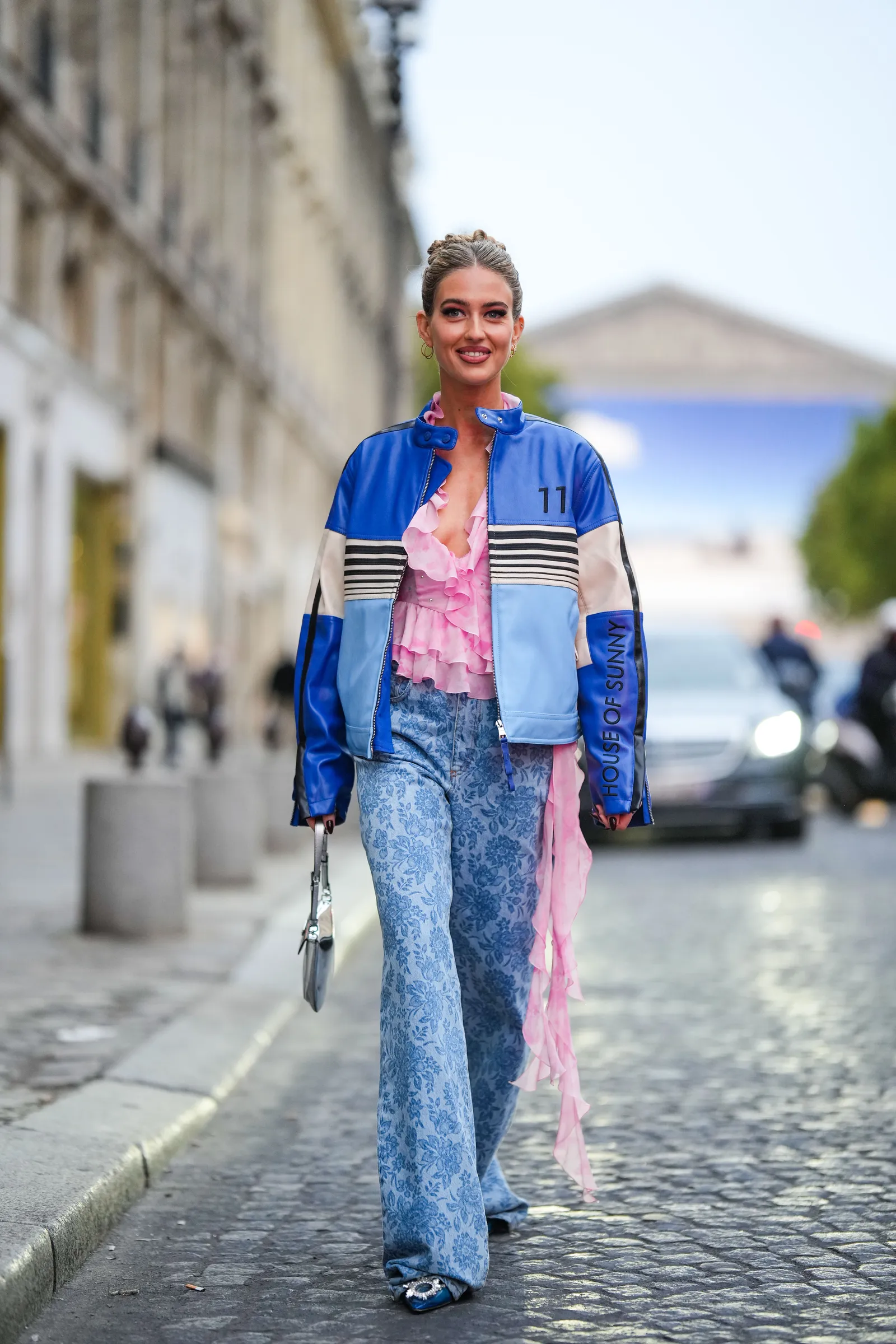PARIS FRANCE  SEPTEMBER 30 Emili Sindlev wears a pale pink and white tie and dye...