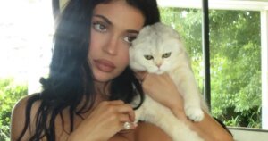 Kylie Jenner Shows Off Her Stylish Gucci Swimsuit with Fun Heart-Shaped Grills