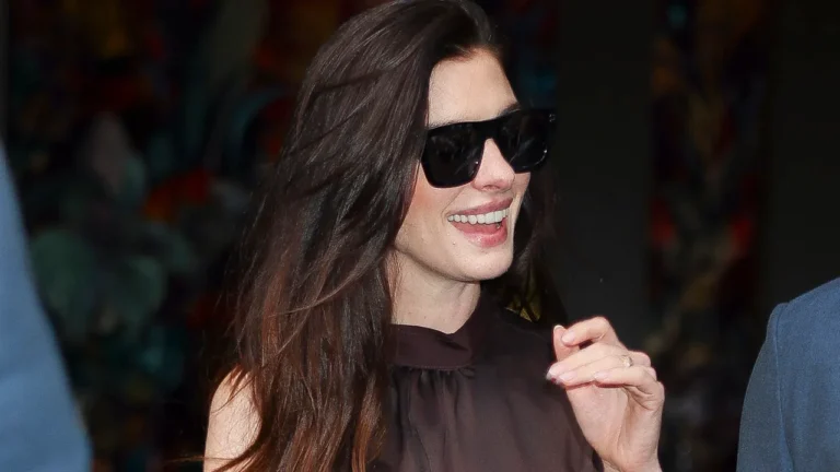 Anne Hathaway Shows How to Style Your Summer Slip Dress with Bright Sneakers and No-Show Socks