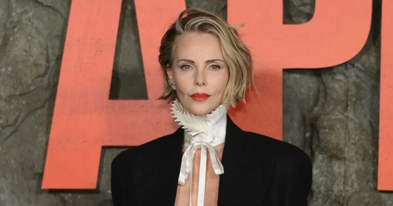 Charlize Theron Stuns in Blazer, Flaunting Underboob at 'Apex' Premiere