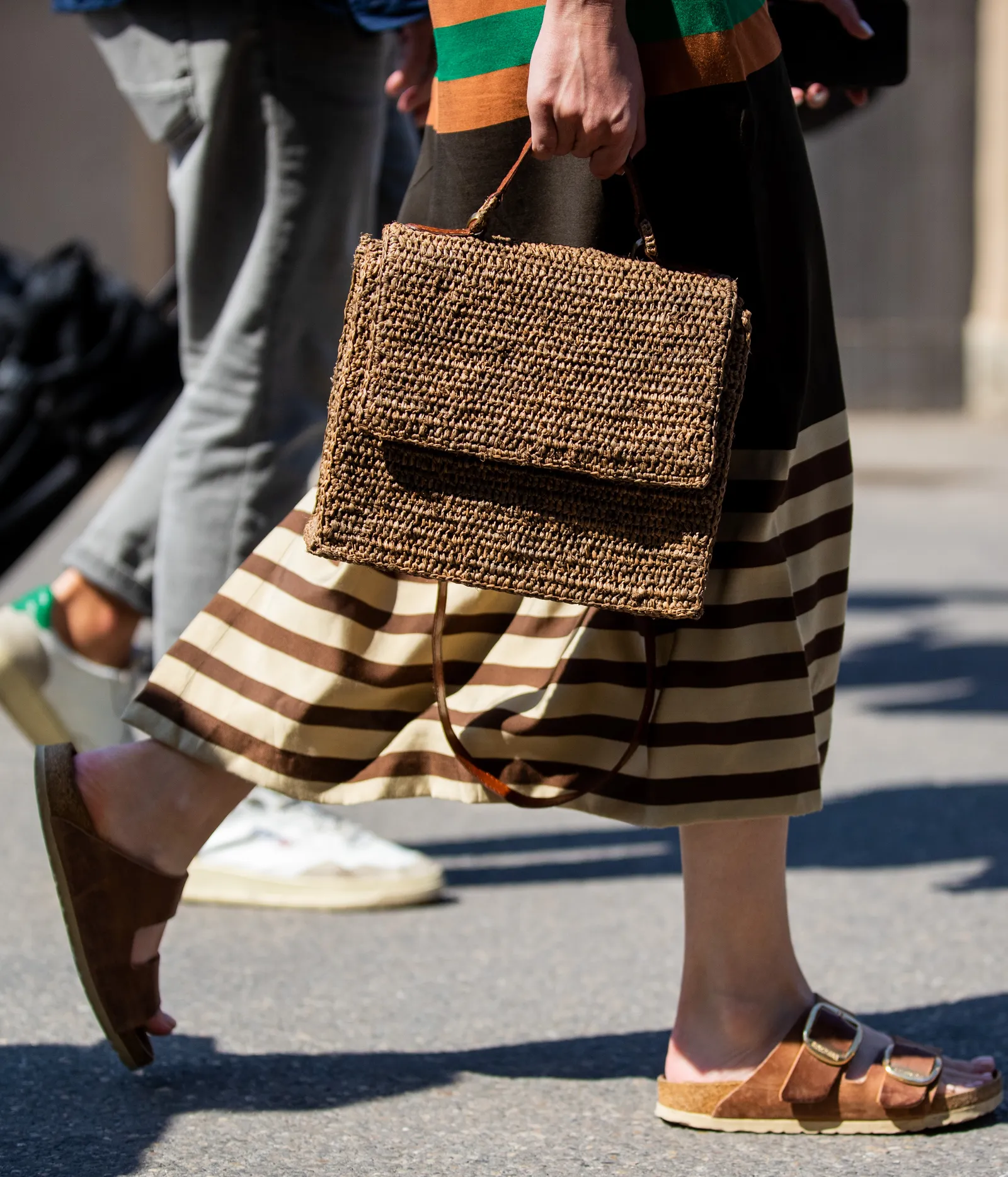 FLORENCE ITALY  JUNE 15 A guest is seen wearing brown bag Birkenstock sandals at the Pitti Immagine Uomo 102 at Fortezza...