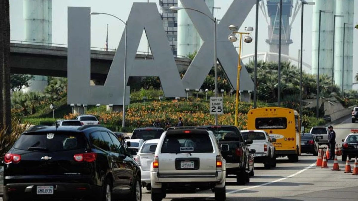 Frontier Jet Experiences Near Miss with Service Trucks at LAX