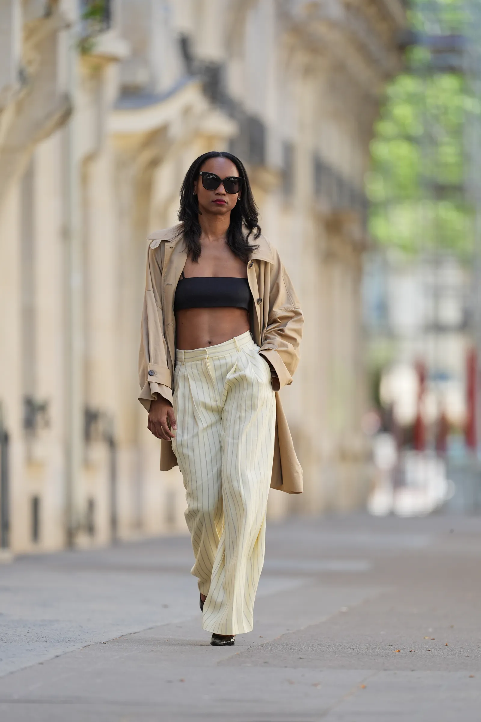 Image may contain Clothing Pants Coat Adult Person Sleeve and Jeans
