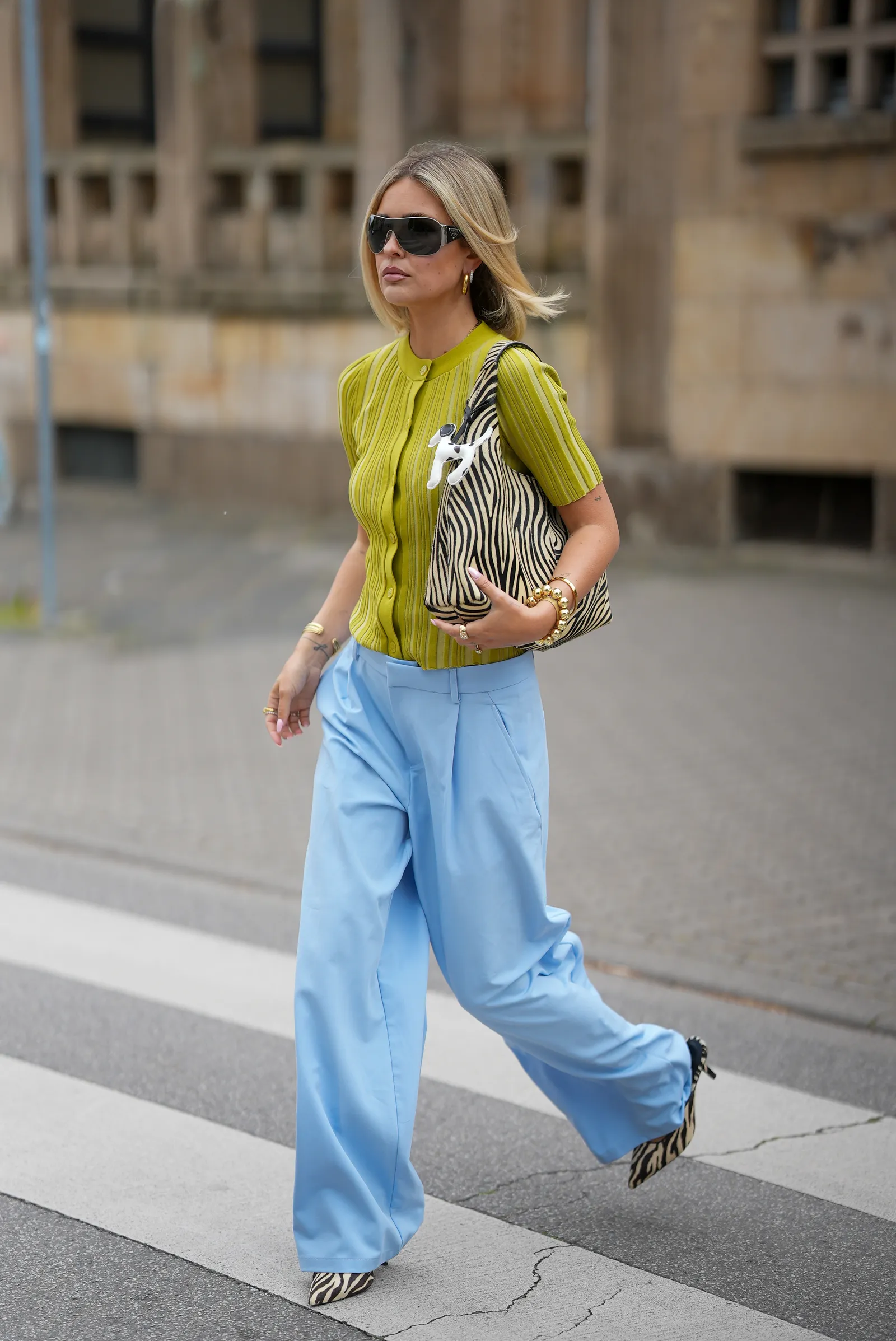 FRANKFURT AM MAIN GERMANY APRIL 21 Julia Kammerer is seen wearing a green ribbed buttonfront cardigan top...