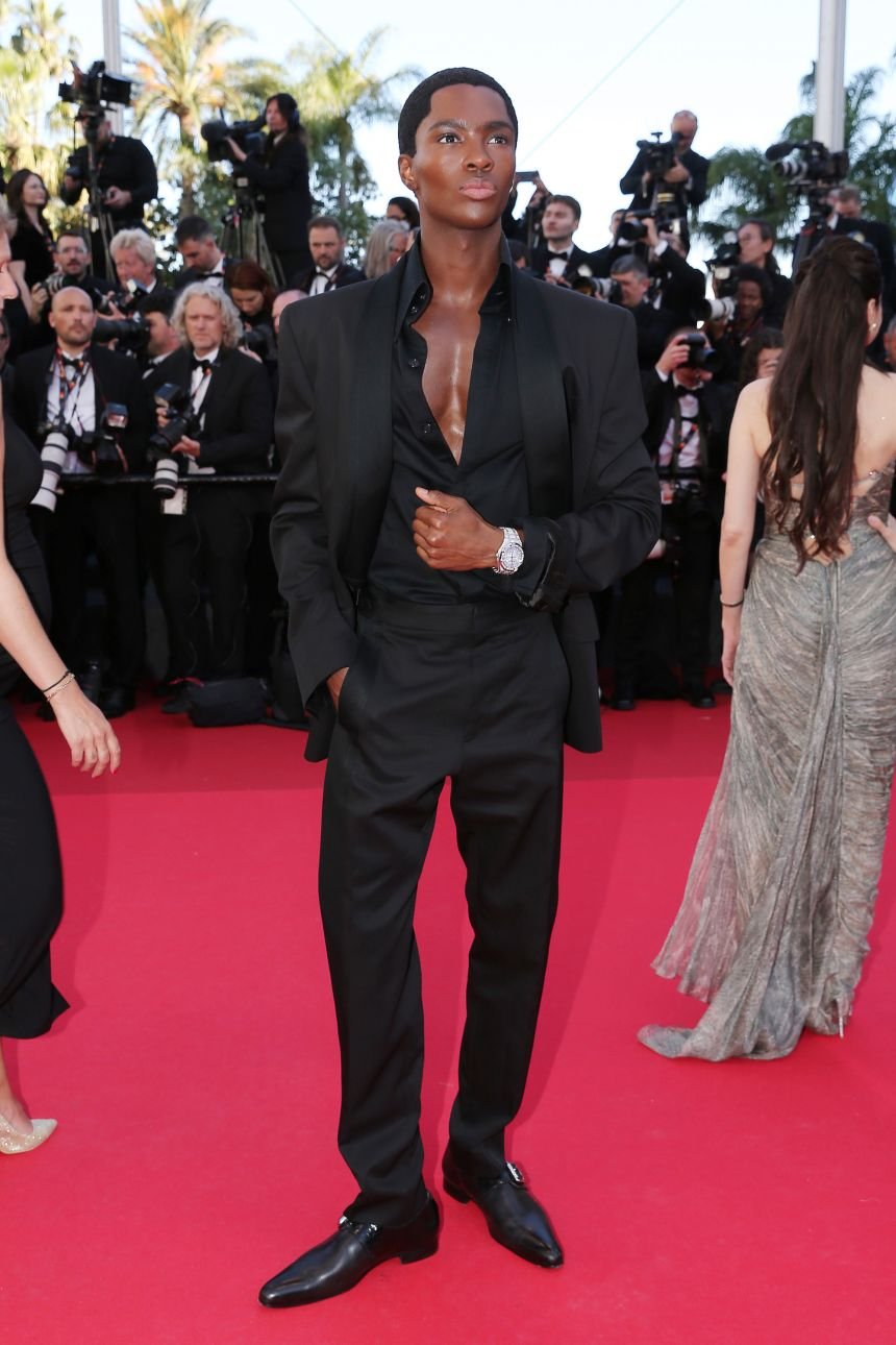 Alton Mason ditched the shirt and tie for an unbuttoned opening night look.
