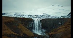 A glacial tongue behind a waterfall in Iceland.